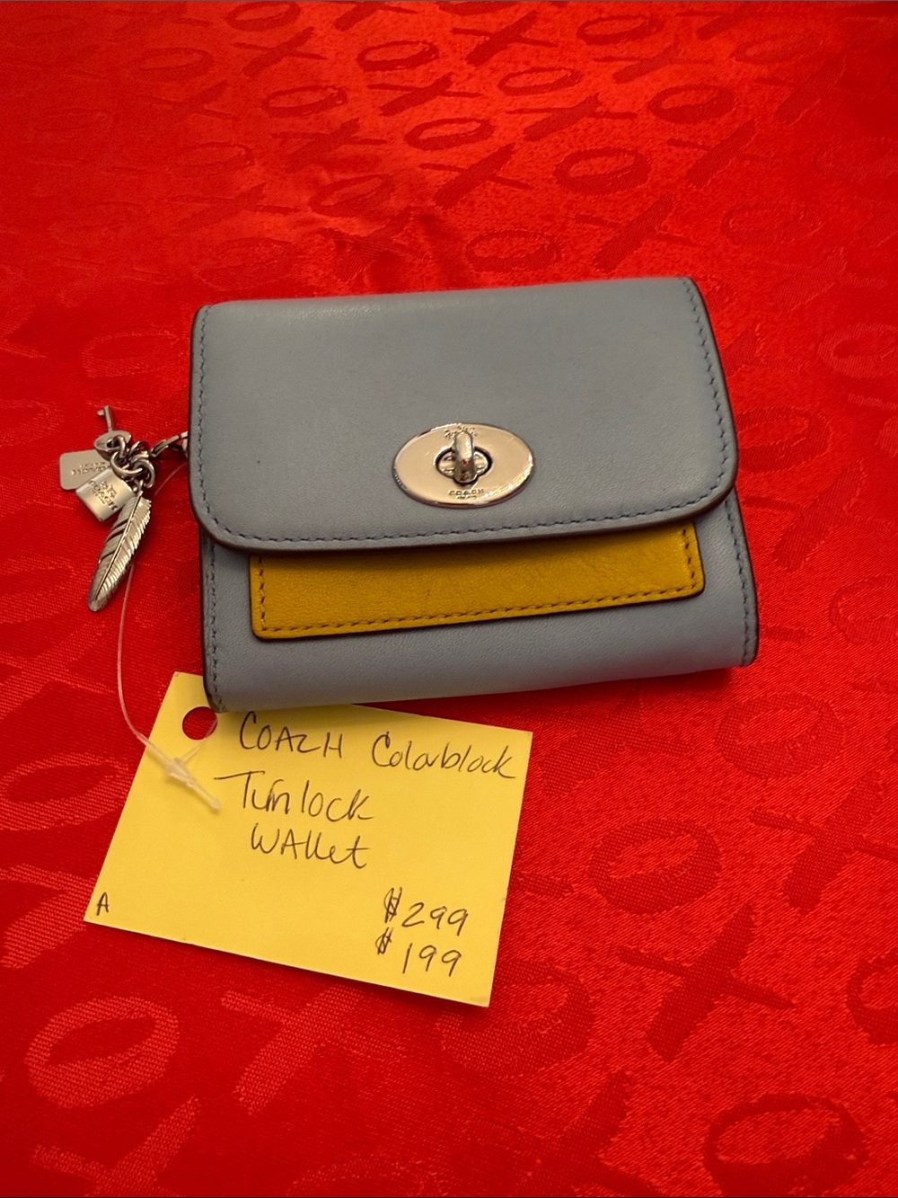 Coach Colorblock Turnlock Wallet in Light Blue and Mustard